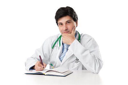simsearch:400-07334526,k - Doctor with stethoscope around his neck looking at the camera Photographie de stock - Aubaine LD & Abonnement, Code: 400-07472849