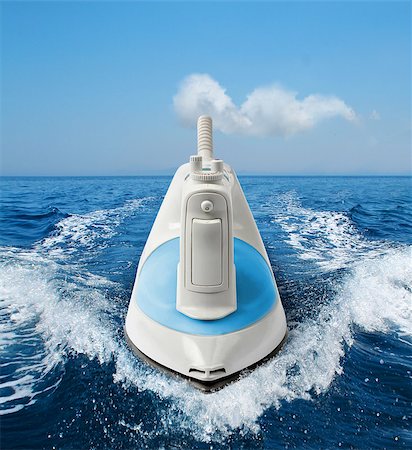 simsearch:400-03988966,k - Easy homework concept ironing, flat-iron surfing on sea Stock Photo - Budget Royalty-Free & Subscription, Code: 400-07473036