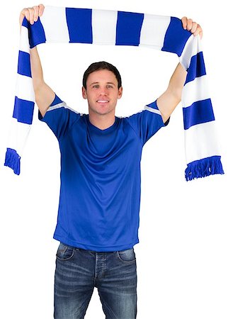 Football fan in blue holding scarf on white background Stock Photo - Budget Royalty-Free & Subscription, Code: 400-07484944