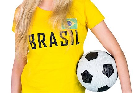 Pretty football fan in brasil tshirt on white background Stock Photo - Budget Royalty-Free & Subscription, Code: 400-07485005
