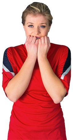 Nervous football fan in red on white background Stock Photo - Budget Royalty-Free & Subscription, Code: 400-07485035