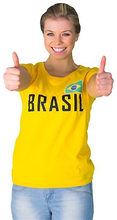 Pretty football fan in brasil tshirt on white background Stock Photo - Budget Royalty-Free & Subscription, Code: 400-07485071