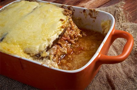 eggplant sauce - Lamb moussaka with egg plant cheese in baking form.farm-style Stock Photo - Budget Royalty-Free & Subscription, Code: 400-07485291