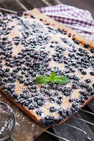 photos of blueberries for kitchen - Homemade blueberry cake cooled on the rack Stock Photo - Budget Royalty-Free & Subscription, Code: 400-07485794
