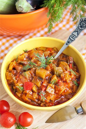 eggplant stew - Vegetable stew (Ratatouille) in yellow bowl on the table Stock Photo - Budget Royalty-Free & Subscription, Code: 400-07480476