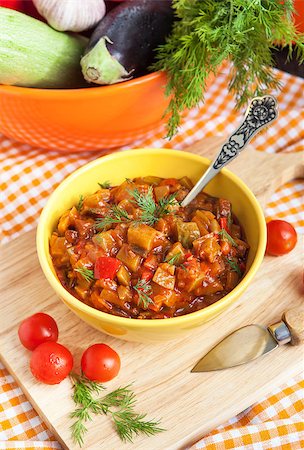 eggplant stew - Vegetable stew (Ratatouille) in yellow bowl on the table Stock Photo - Budget Royalty-Free & Subscription, Code: 400-07480473