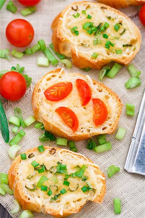 simsearch:400-08014878,k - Delicious bruschetta with cherry tomatoes and scallion Stock Photo - Budget Royalty-Free & Subscription, Code: 400-07480539
