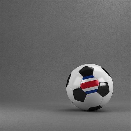 simsearch:400-07466044,k - Costa Rican soccer ball in front of plaster wall Stockbilder - Microstock & Abonnement, Bildnummer: 400-07480848