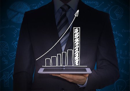 sketch arrows - Man in suit holding tablet pc. Above the screen of the tablet are growing graph Stock Photo - Budget Royalty-Free & Subscription, Code: 400-07481243