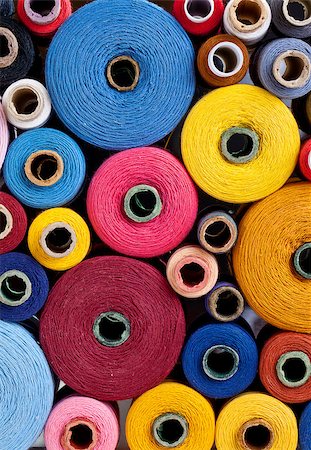 vertical close up of spools of thread of different size, texture and colour Stock Photo - Budget Royalty-Free & Subscription, Code: 400-07481385