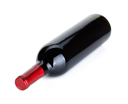 simsearch:400-06796159,k - Lying red wine bottle. Isolated on white background Stock Photo - Budget Royalty-Free & Subscription, Code: 400-07481657