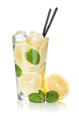 Glass of lemonade with lemon and mint. Isolated on white background Stock Photo - Budget Royalty-Free & Subscription, Code: 400-07481733