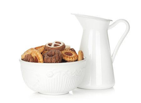 simsearch:400-08862169,k - Various cookies in bowl and milk jug. Isolated on white  background Stockbilder - Microstock & Abonnement, Bildnummer: 400-07481776