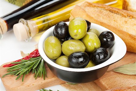simsearch:400-07219392,k - Italian food appetizer of olives, bread and spices. Isolated on white background Stock Photo - Budget Royalty-Free & Subscription, Code: 400-07481815