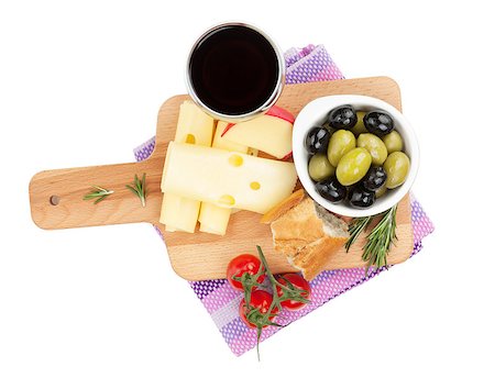 Red wine with cheese, bread, olives and spices. Isolated on white background Stock Photo - Budget Royalty-Free & Subscription, Code: 400-07481826
