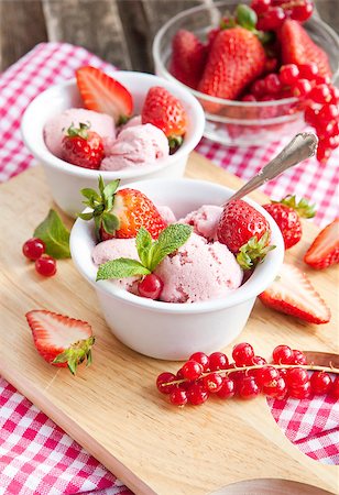 strawberry sorbet - Homemade strawberry ice cream decorated with fresh berries and mint Stock Photo - Budget Royalty-Free & Subscription, Code: 400-07482310