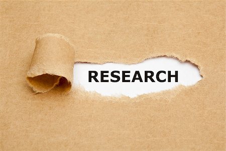The word Research appearing behind torn brown paper. Stock Photo - Budget Royalty-Free & Subscription, Code: 400-07482588