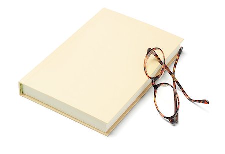 Hardcover Book and Reading Glasses On White Background Stock Photo - Budget Royalty-Free & Subscription, Code: 400-07482750