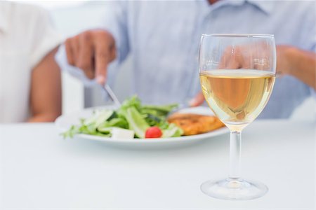 simsearch:400-07483384,k - Glass of white wine on a table outside on a balcony Stock Photo - Budget Royalty-Free & Subscription, Code: 400-07483346