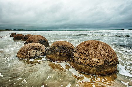 simsearch:400-08888052,k - Moeraki Boulders on the Koekohe beach, Eastern coast of New Zealand. HDR image Stock Photo - Budget Royalty-Free & Subscription, Code: 400-07498514