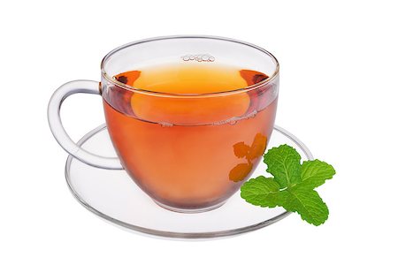 simsearch:400-05215025,k - Glass cup of fresh tea with mint leaves isolated on white background Foto de stock - Royalty-Free Super Valor e Assinatura, Número: 400-07504185