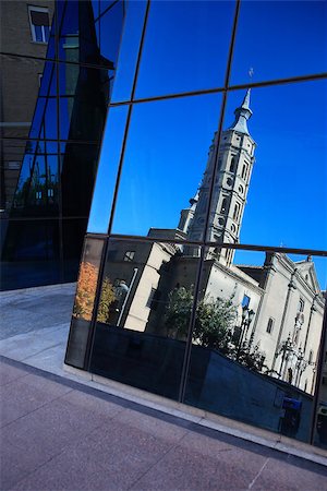 simsearch:400-06526519,k - Modern glass wall with reflection of old church against blue sky Stock Photo - Budget Royalty-Free & Subscription, Code: 400-07504776