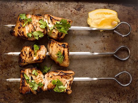 close up of grilled chicken skewers Photographie de stock - Aubaine LD & Abonnement, Code: 400-07505051