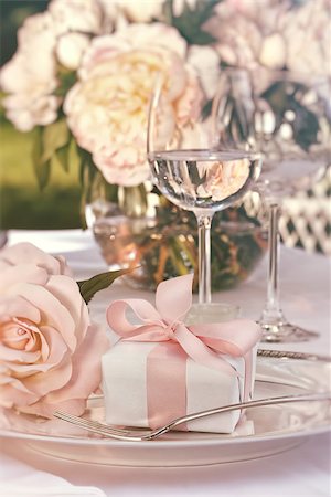 Close-up of small gift on plate at wedding reception Stock Photo - Budget Royalty-Free & Subscription, Code: 400-07506974