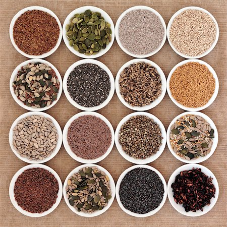 Seed health food selection in white porcealin bowls. Foto de stock - Super Valor sin royalties y Suscripción, Código: 400-07506992