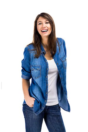 Beautiful woman standing over a white background with hands on the pockets and smiling Stock Photo - Budget Royalty-Free & Subscription, Code: 400-07507626