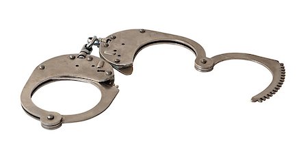 simsearch:400-04407414,k - Steel metallic handcuffs isolated on white background Fotografie stock - Microstock e Abbonamento, Codice: 400-07508060