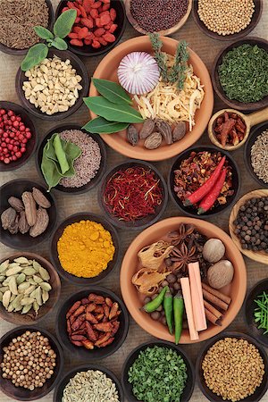 simsearch:400-07510855,k - Large herb and spice selection in bowls. Photographie de stock - Aubaine LD & Abonnement, Code: 400-07508279