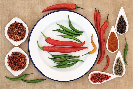 Red, green and orange chilli pepper selection with peppercorns. Stock Photo - Budget Royalty-Free & Subscription, Code: 400-07508280