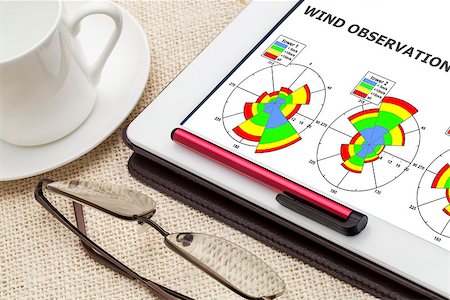 simsearch:400-04789714,k - analyzing data from tower observation network  - wind rose graphs on a digital tablet with a cup of coffee Foto de stock - Super Valor sin royalties y Suscripción, Código: 400-07508935