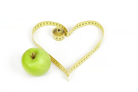 simsearch:400-04105649,k - green apple with a measuring tape and heart symbol isolated on white background Foto de stock - Super Valor sin royalties y Suscripción, Código: 400-07509438