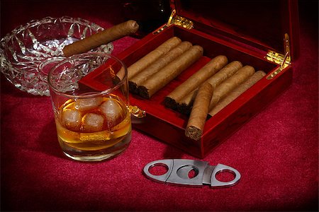 simsearch:400-05292494,k - cigars in the box and glass with whisky, close up shallow dof Stock Photo - Budget Royalty-Free & Subscription, Code: 400-07501383