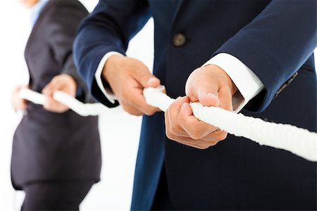 simsearch:400-05009097,k - Two businessman work together and playing tug of war Stock Photo - Budget Royalty-Free & Subscription, Code: 400-07503455