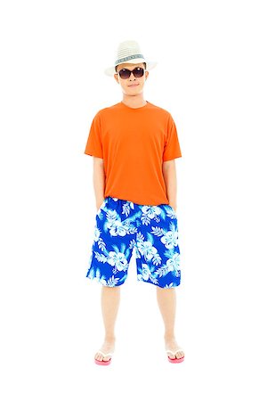 sunny man wearing beach short  and Flip Flops Stock Photo - Budget Royalty-Free & Subscription, Code: 400-07503508