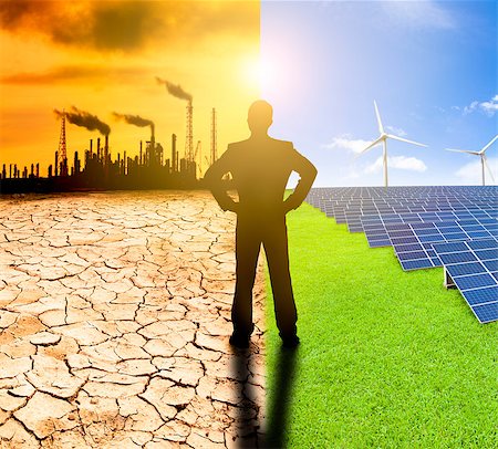 solar panels business - pollution and clean energy concept. businessman watching windmills solar panels and refinery with air pollution Stock Photo - Budget Royalty-Free & Subscription, Code: 400-07514091