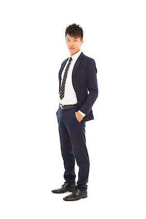 simsearch:400-07820348,k - handsome businessman standing and hands in his pockets Photographie de stock - Aubaine LD & Abonnement, Code: 400-07514103