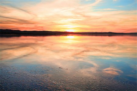 simsearch:400-07514503,k - Magnificent sunset and water reflections at Long Jetty, NSW Australia Stock Photo - Budget Royalty-Free & Subscription, Code: 400-07514502