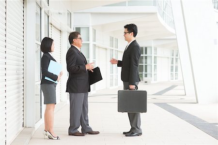 simsearch:400-07515329,k - Full length Asian business team meeting, having discussion over office. Stock Photo - Budget Royalty-Free & Subscription, Code: 400-07515307