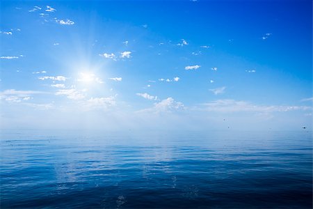 Beautiful sunny day with blue sky over the sea. Calm. Fotografie stock - Microstock e Abbonamento, Codice: 400-07516285