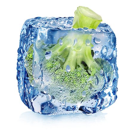 fresh glass of ice water - Broccoli in ice cube isolated on white Stock Photo - Budget Royalty-Free & Subscription, Code: 400-07516485