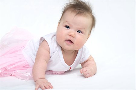 White caucasian Newborn baby in pink dress Foto de stock - Royalty-Free Super Valor e Assinatura, Número: 400-07517188