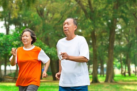 happy senior couple running together in the park Stock Photo - Budget Royalty-Free & Subscription, Code: 400-07517994
