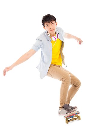 simsearch:400-07481076,k - young man Skateboard to jump isolated on white background Photographie de stock - Aubaine LD & Abonnement, Code: 400-07518047