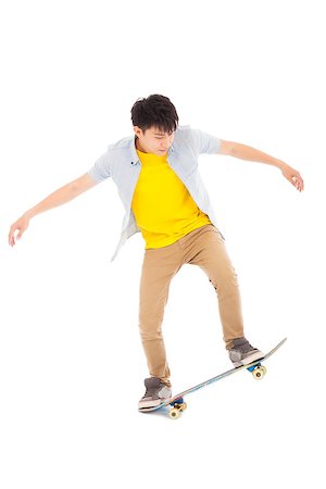 simsearch:400-07481076,k - young man Skateboard to jump isolated on white background Photographie de stock - Aubaine LD & Abonnement, Code: 400-07518052