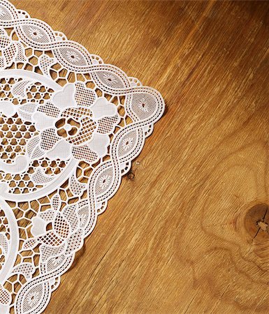 old wooden background with white lace napkin Stock Photo - Budget Royalty-Free & Subscription, Code: 400-07518768