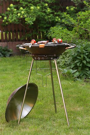 round metal  barbecue grill appliance  picnic outdoors Stock Photo - Budget Royalty-Free & Subscription, Code: 400-07518784